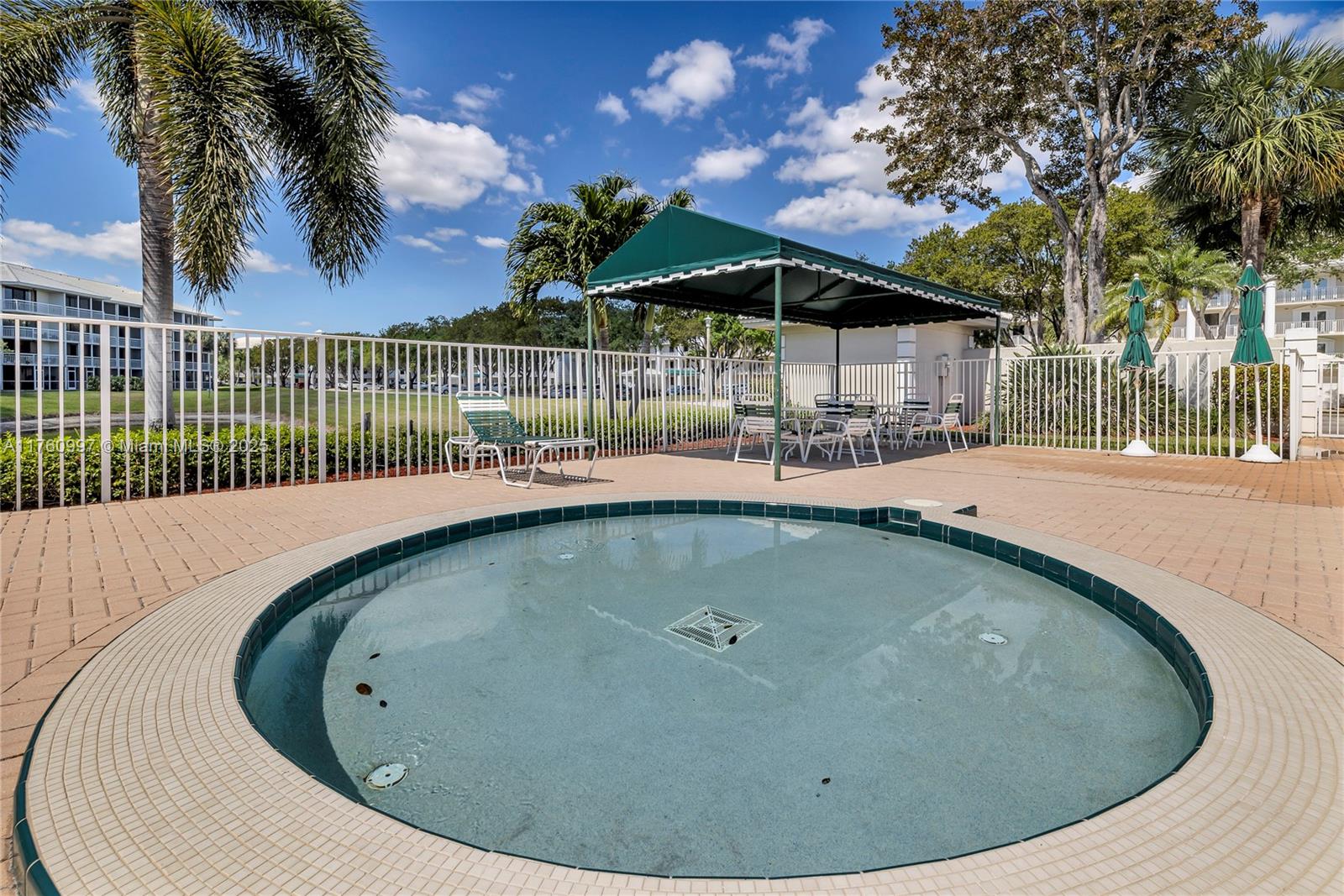 6025 Balboa Circle, Unit 204 Boca Raton, FL 33433 - Photo 34 of 38 a view of outdoor space and swimming pool