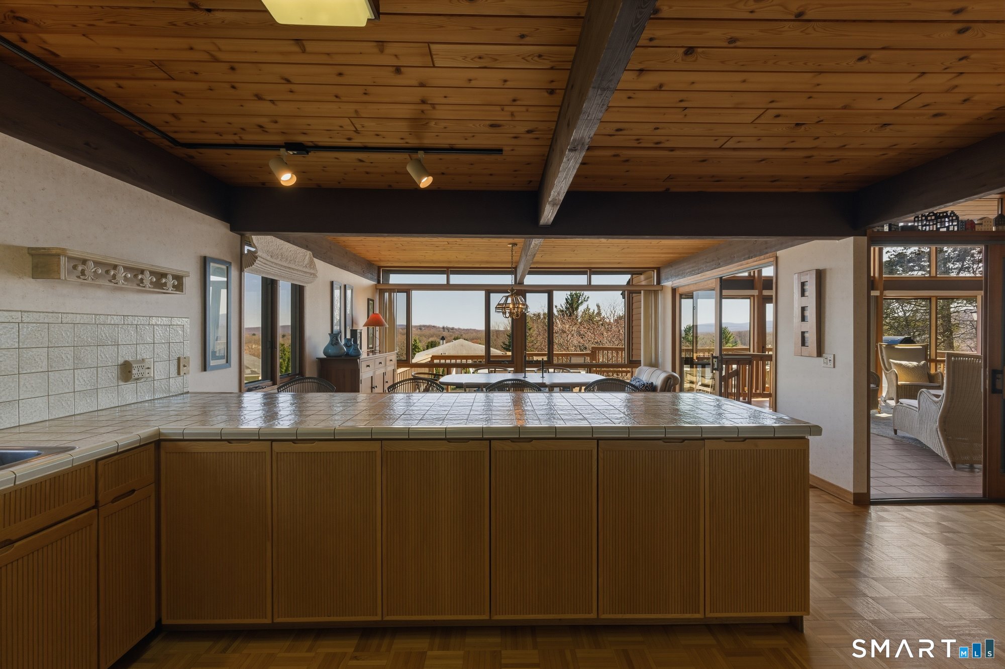 279 Mooreland Road Berlin, CT 06037 - Photo 11 of 40 Breakfast bar in kitchen that is open to dining room.