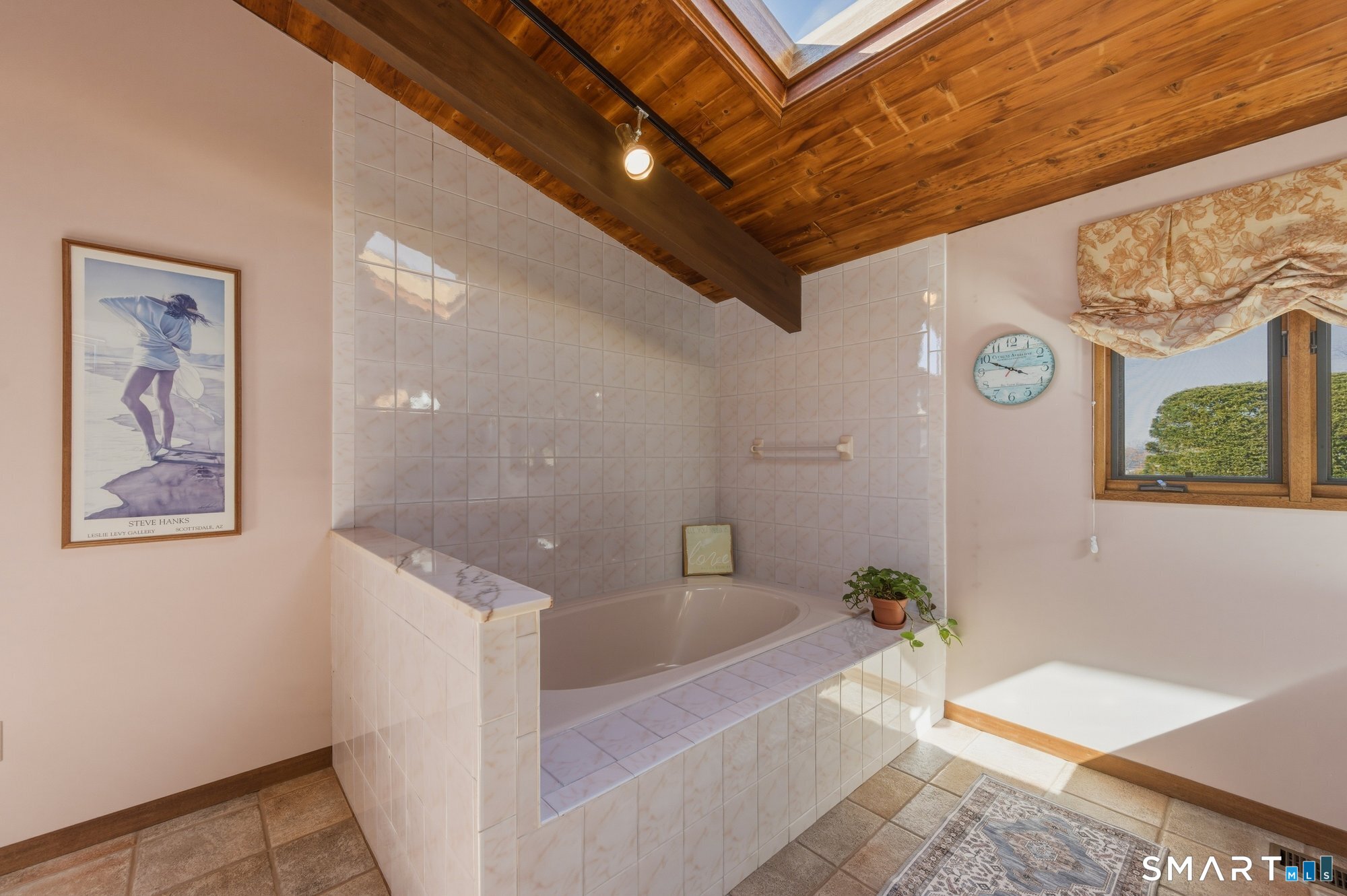 279 Mooreland Road Berlin, CT 06037 - Photo 20 of 40 Cathedral tongue and groove cedar wood ceiling, tile floor. Soaking tub and separate shower, large vanity area.