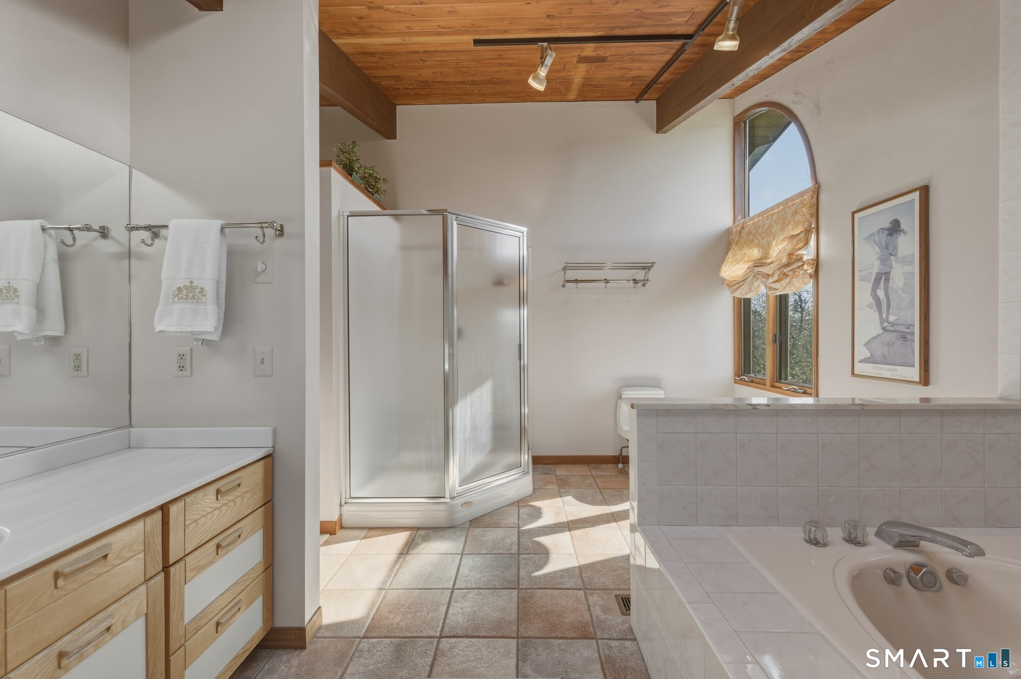 279 Mooreland Road Berlin, CT 06037 - Photo 21 of 40 Cathedral tongue and groove cedar wood ceiling, tile floor. Soaking tub and separate shower, large vanity area.