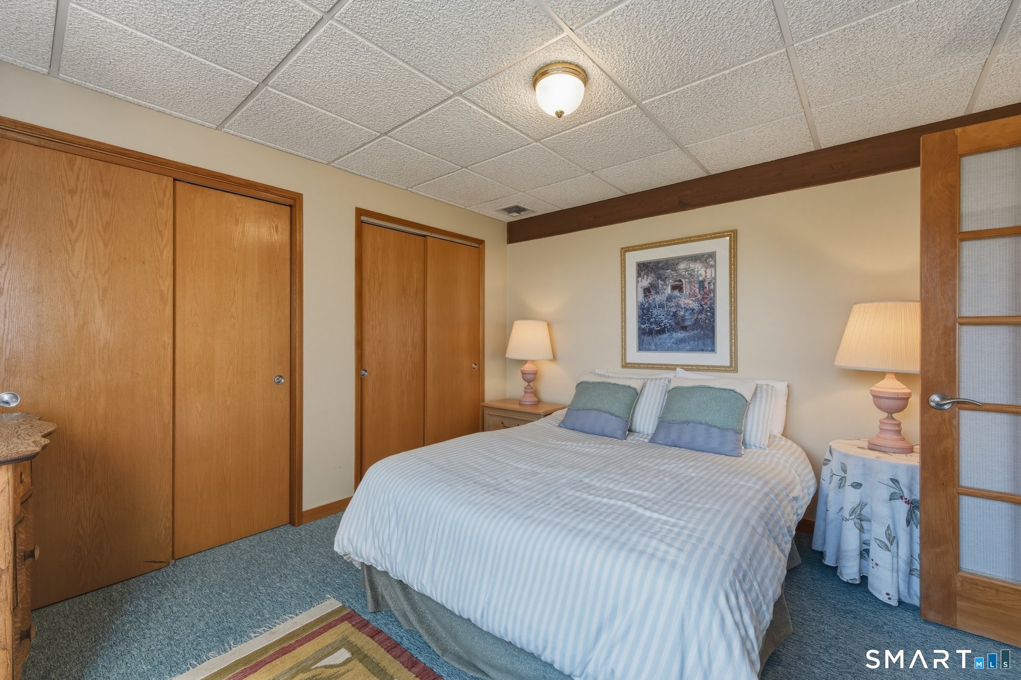 279 Mooreland Road Berlin, CT 06037 - Photo 31 of 40 4th bedroom lower level. French doors, plenty of closet space.