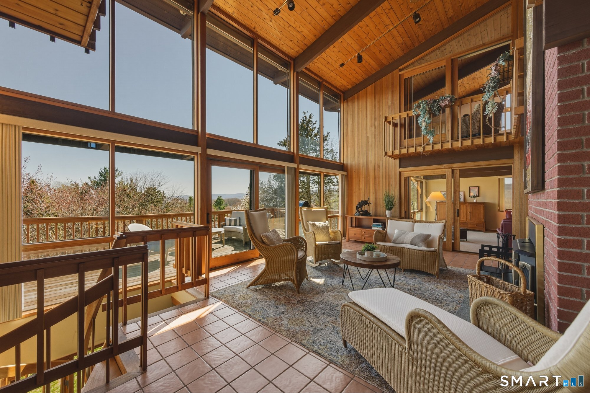 279 Mooreland Road Berlin, CT 06037 - Photo 6 of 40 Gorgeous vista views! Floor to ceiling two-story windows, cathedral ceilings with cedar tongue and groove architectural details. Mahogany trimmed windows. Sun-filled!