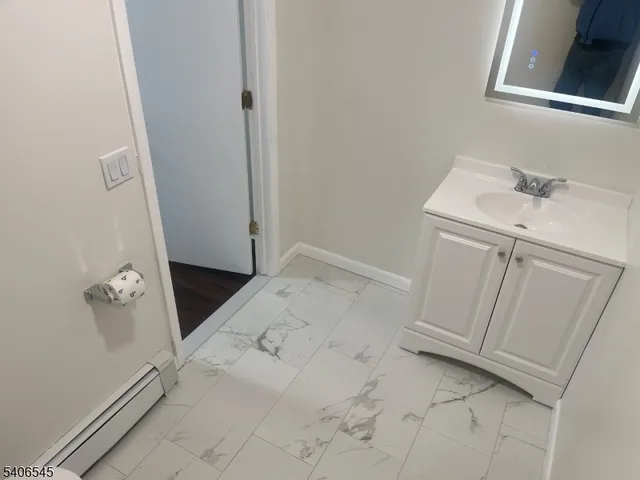 a view of utility room with a sink