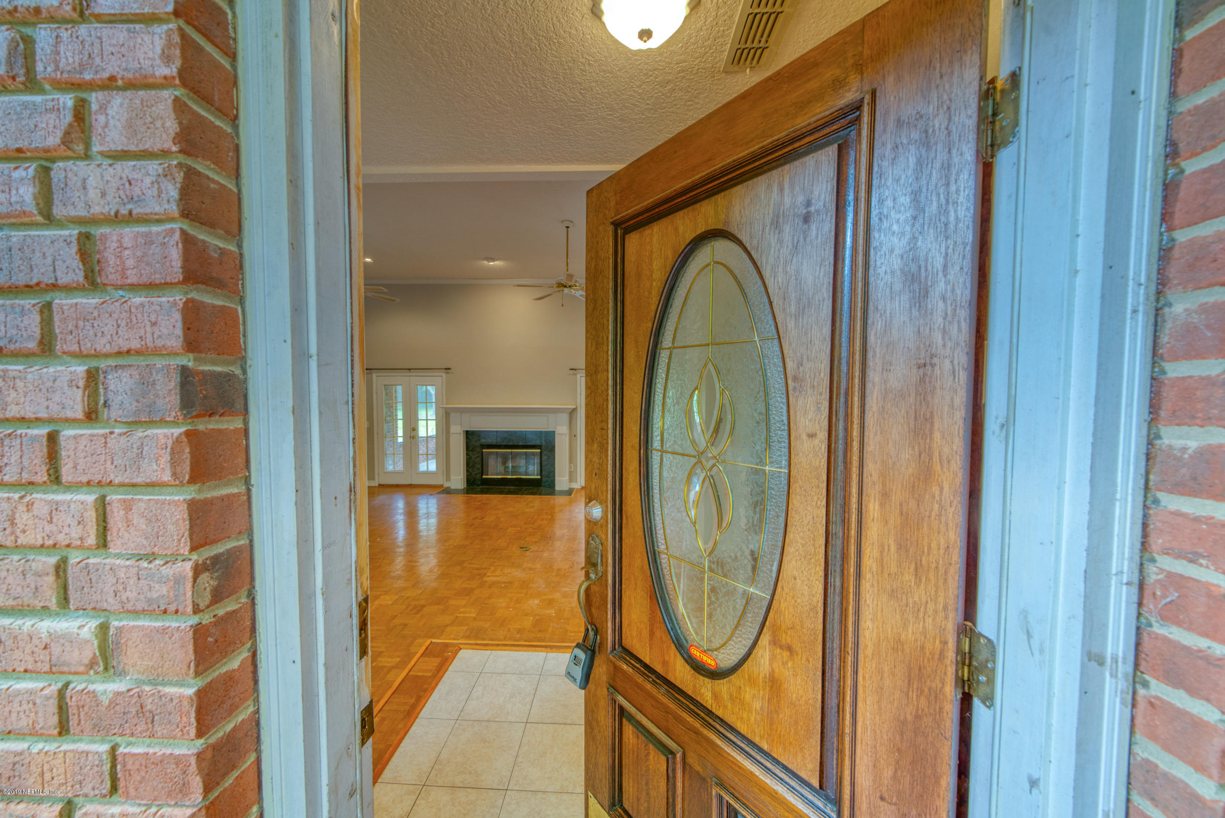 43611 Ratliff Road Callahan, FL 32011 - Photo 21 of 43 a view of a bathroom with mirror gate