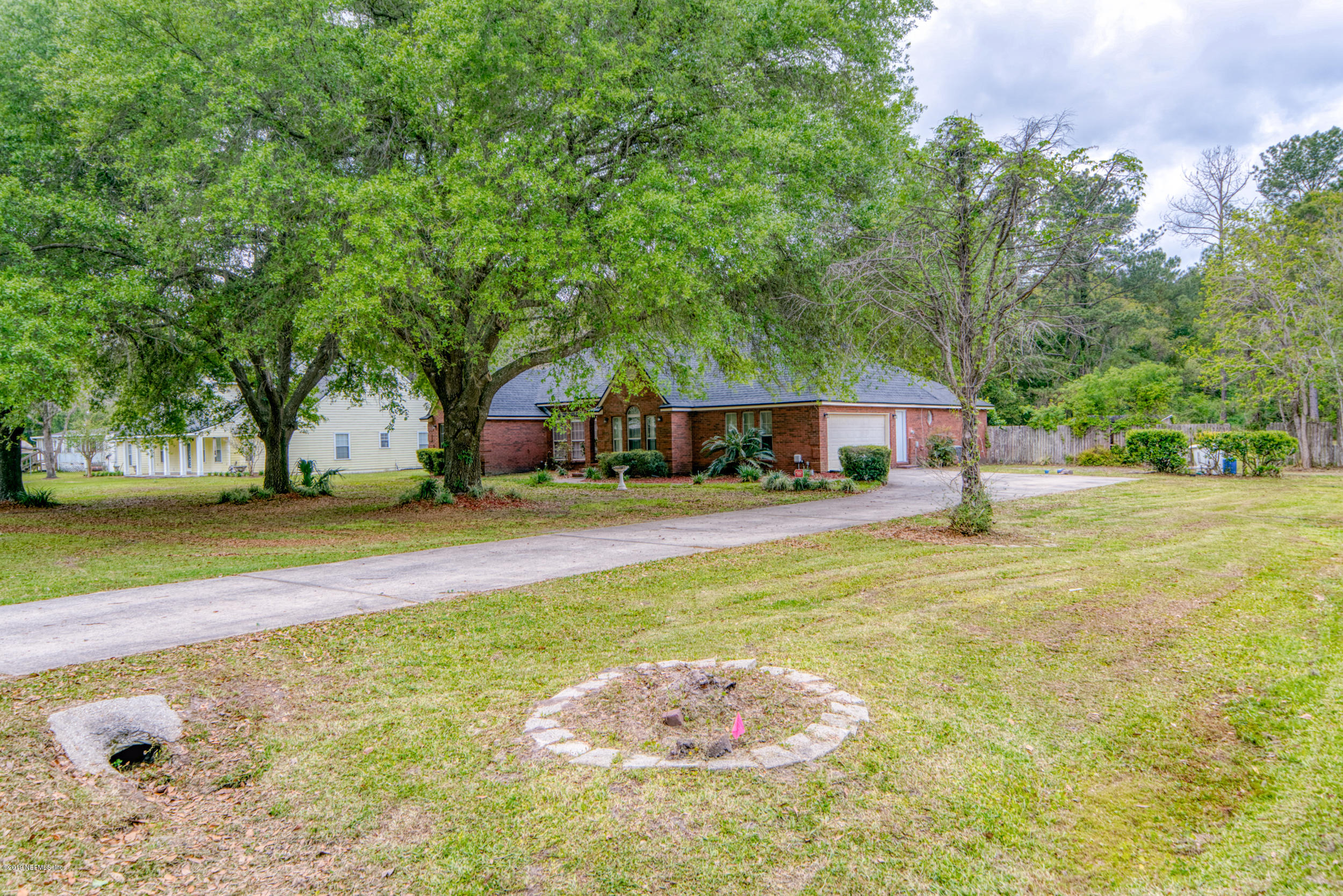 43611 Ratliff Road Callahan, FL 32011 - Photo 8 of 43 a front view of a house with a yard