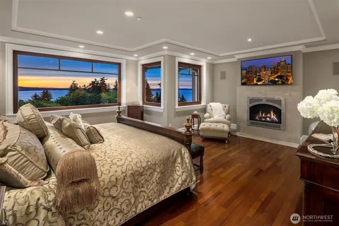 a living room with furniture fireplace and flat screen tv