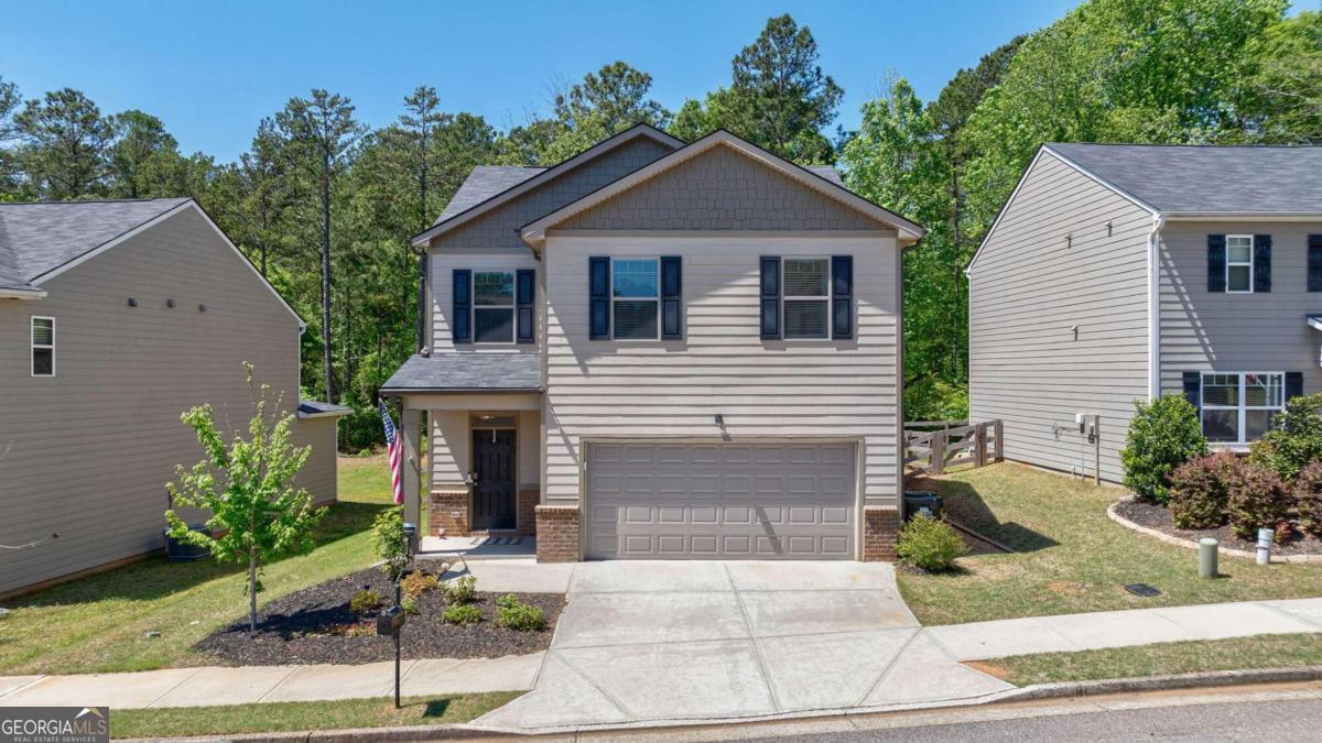 320 Classic Road Athens, GA 30606 - Photo 1 of 1 a front view of a house with a yard and garage