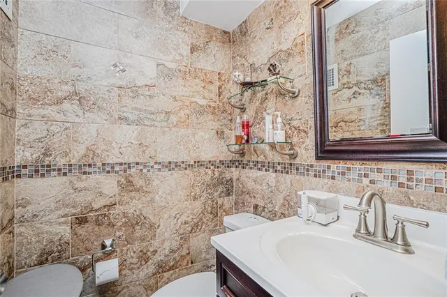 a bathroom with a sink and a toilet