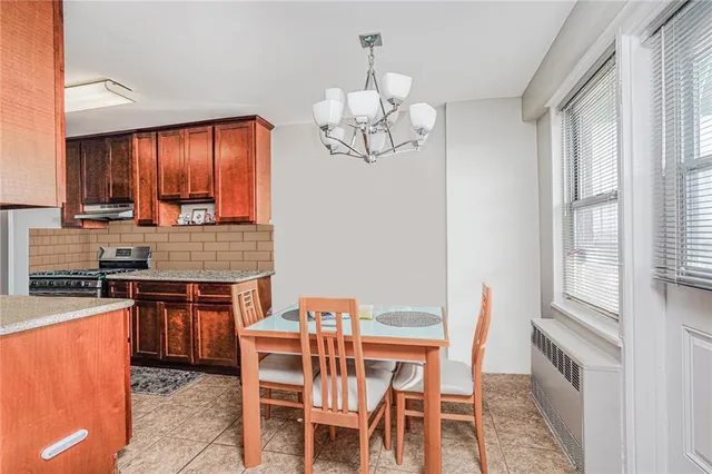 a table and chairs in a kitchen