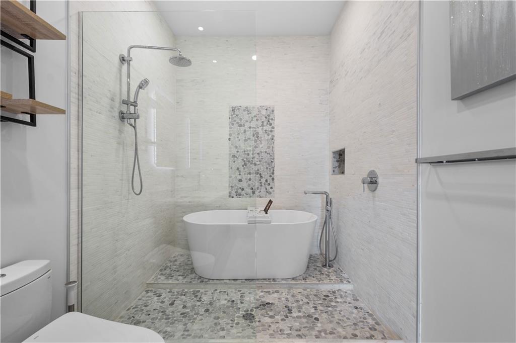 2545 Penn Avenue, Unit 601 Pittsburgh, PA 15222 - Photo 41 of 48 a bathroom with a sink toilet and shower