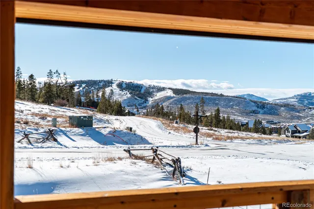 a view of a terrace with wooden fence