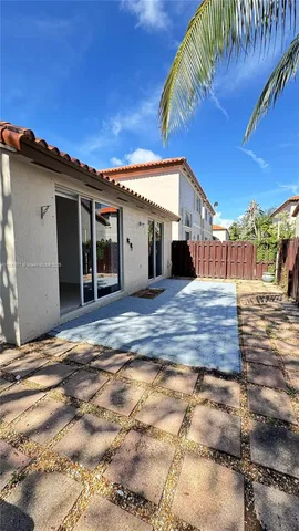 a view of a house with a patio