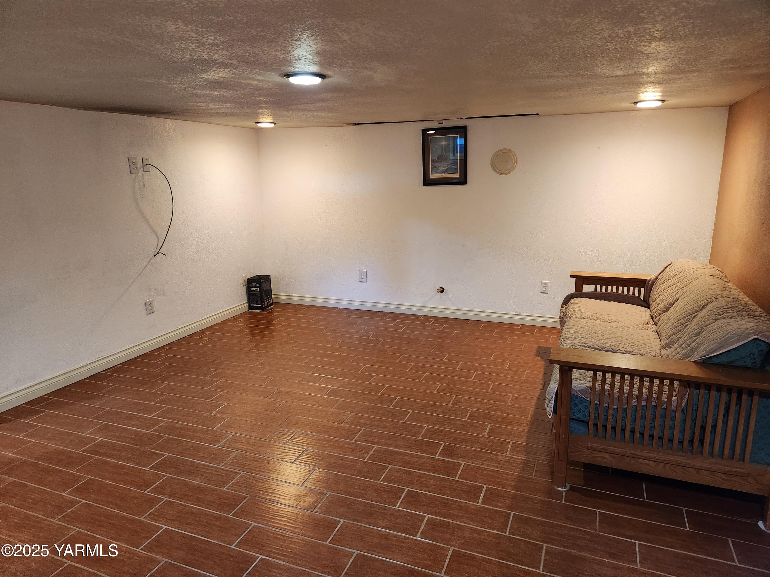 10 South Date Street Toppenish, WA 98948 - Photo 31 of 37 a view of a livingroom with wooden floor