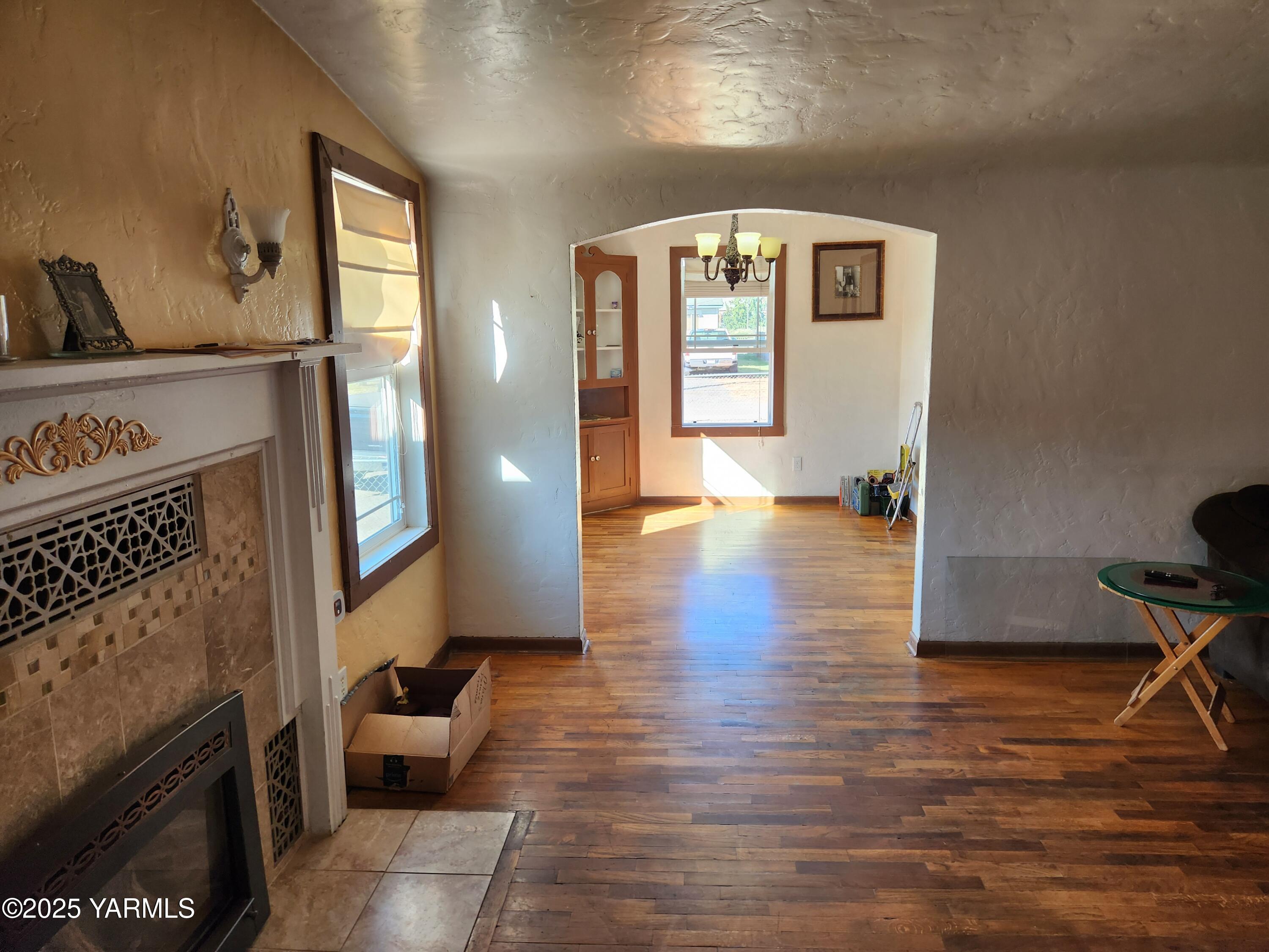 10 South Date Street Toppenish, WA 98948 - Photo 9 of 37 a view of livingroom with furniture and wooden floor
