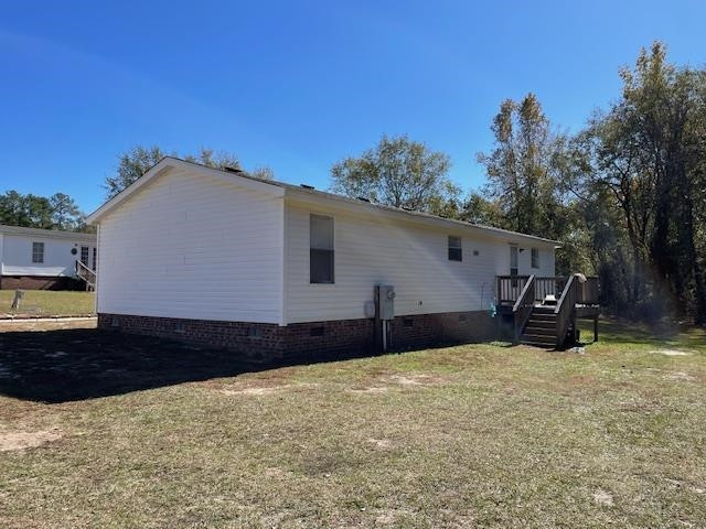 6640 Muscat Road Hope Mills, NC 28348 - Photo 11 of 22 a view of a house with a yard