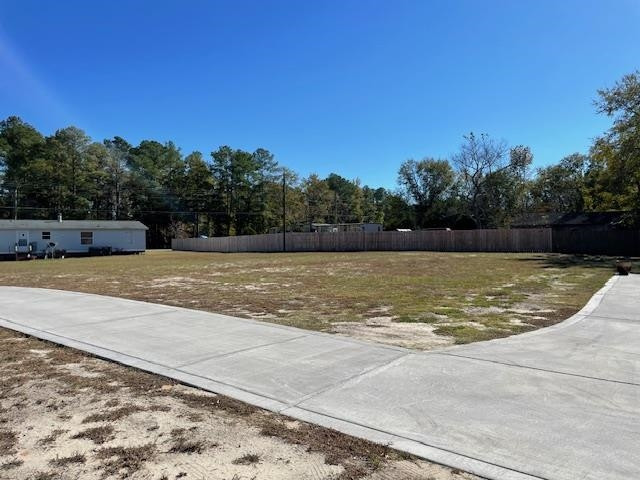 6640 Muscat Road Hope Mills, NC 28348 - Photo 17 of 22 a view of a swimming pool and lake