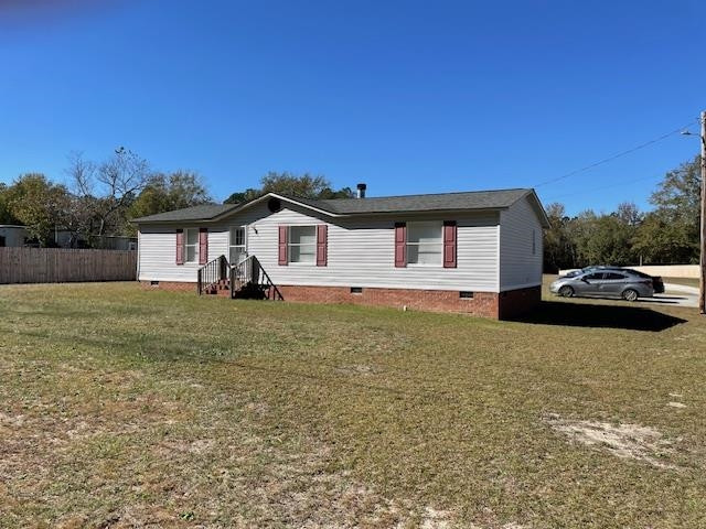 6640 Muscat Road Hope Mills, NC 28348 - Photo 4 of 22 a front view of a house with a yard