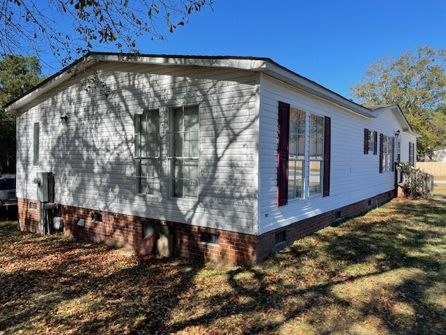 6640 Muscat Road Hope Mills, NC 28348 - Photo 6 of 22 a view of a house with a yard