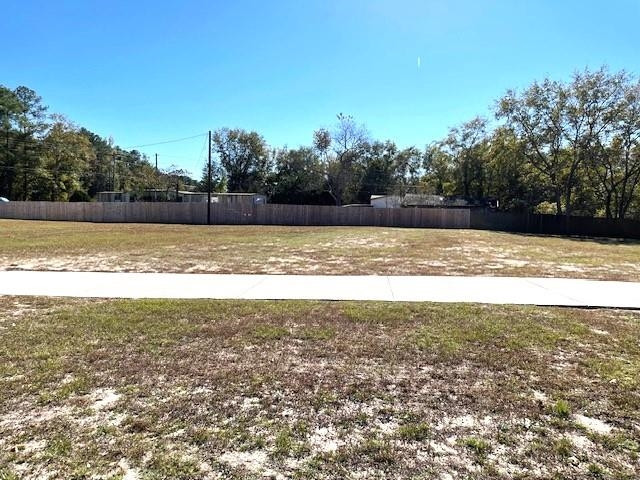 6640 Muscat Road Hope Mills, NC 28348 - Photo 9 of 22 a view of a swimming pool and a yard