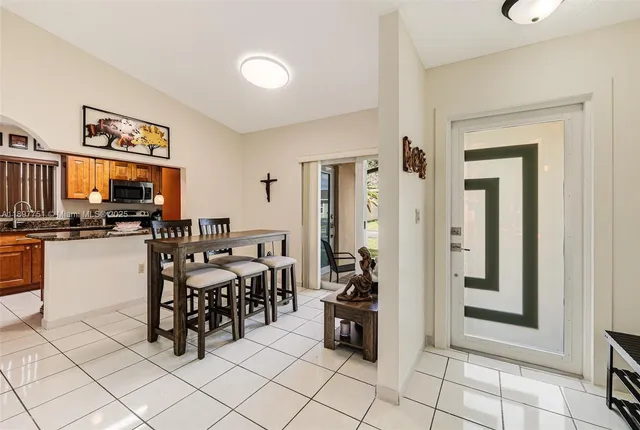 a view of a dining room with furniture
