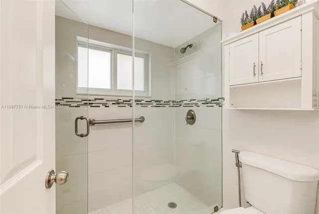 a view of backyard with tub and outdoor space