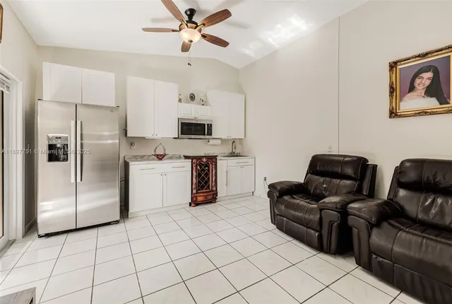 a view of a pathway of a house with a yard