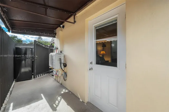 a bathroom with a double vanity sink mirror and shower