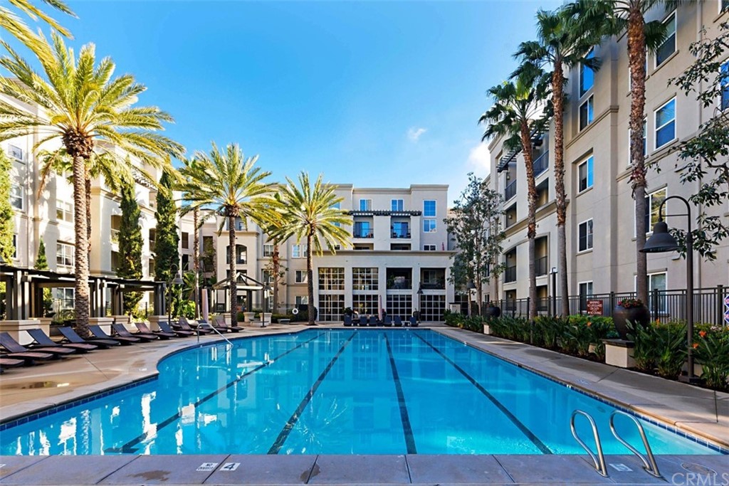 1326 Scholarship Irvine, CA 92612 - Photo 18 of 22 a swimming pool with outdoor seating and yard
