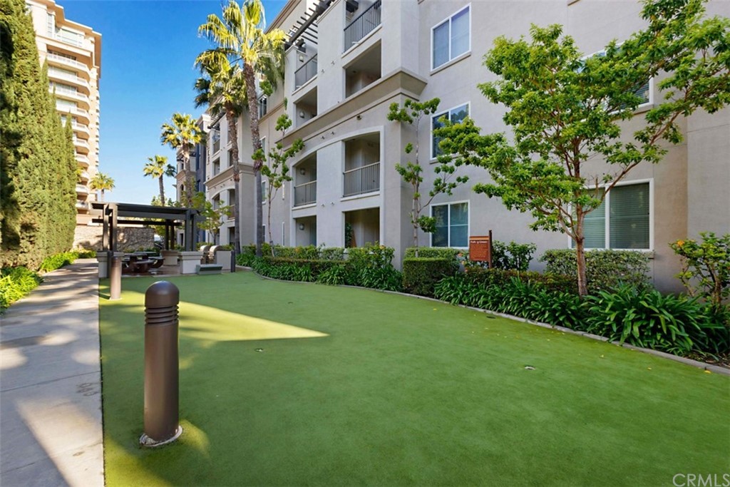 1326 Scholarship Irvine, CA 92612 - Photo 21 of 22 a front view of a building with garden