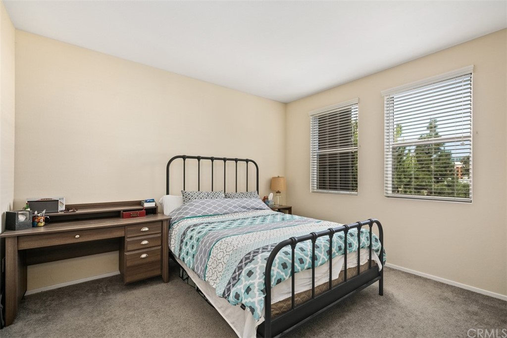 1326 Scholarship Irvine, CA 92612 - Photo 8 of 22 a bedroom with a bed and a window