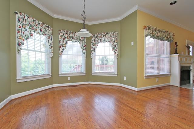 7278 Old Franklin Road Fairview, TN 37062 - Photo 5 of 20 The breakfast area's bay windows overlook the back yard.