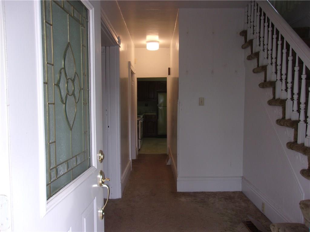3 Maple Street Trafford, PA 15085 - Photo 2 of 24 Sunlit entry leads to living and dining rooms on left, with kitchen straight ahead.