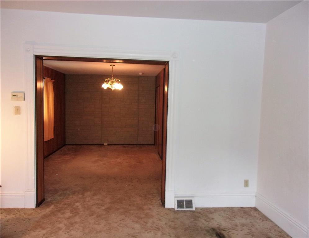 3 Maple Street Trafford, PA 15085 - Photo 4 of 24 Living room view into dining room.