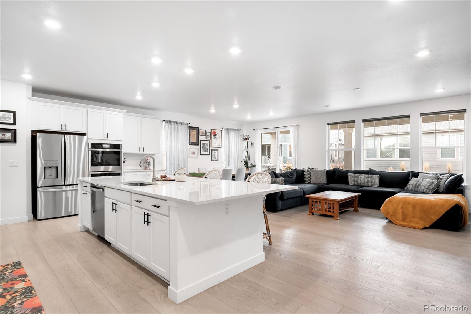 1928 Marlowe Circle West Erie, CO 80516 - Photo 11 of 47 a living room with stainless steel appliances furniture and a window