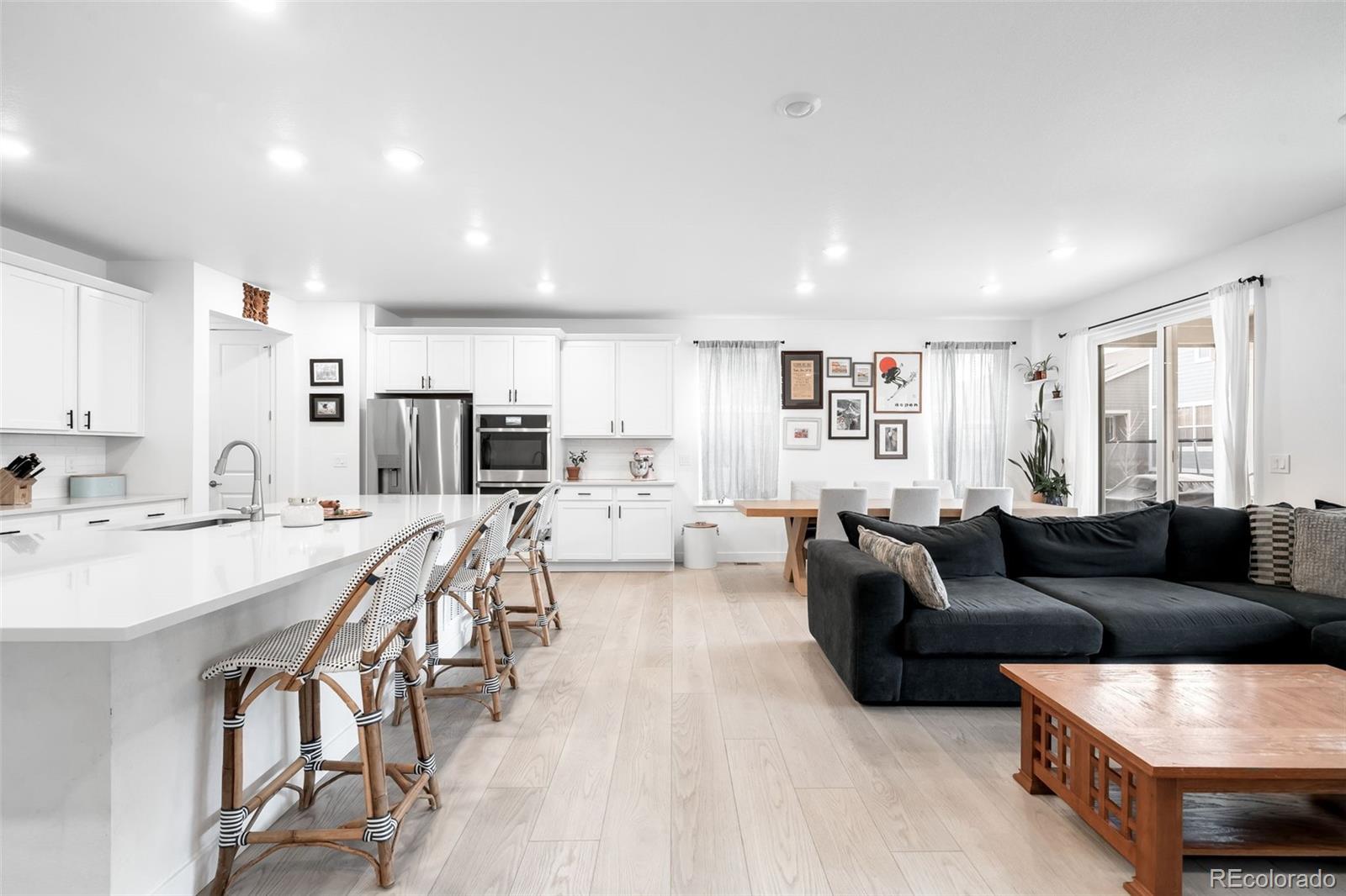 1928 Marlowe Circle West Erie, CO 80516 - Photo 14 of 47 a living room with furniture and a flat screen tv