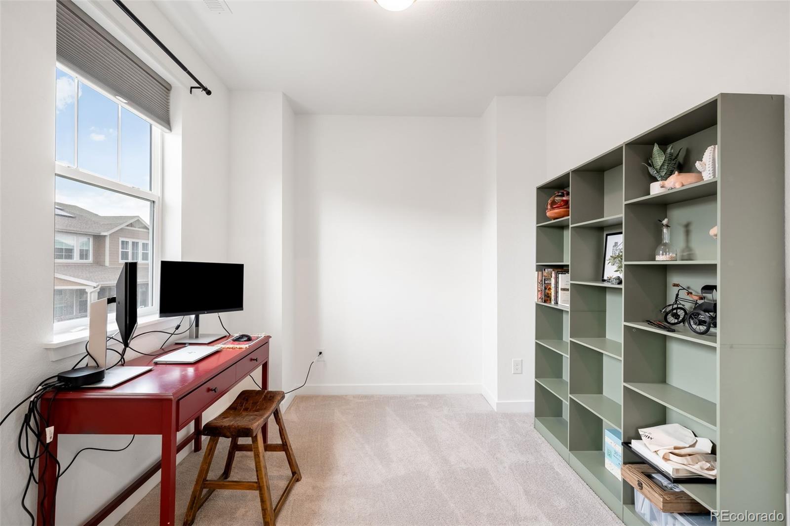 1928 Marlowe Circle West Erie, CO 80516 - Photo 19 of 47 a view of a workspace with furniture