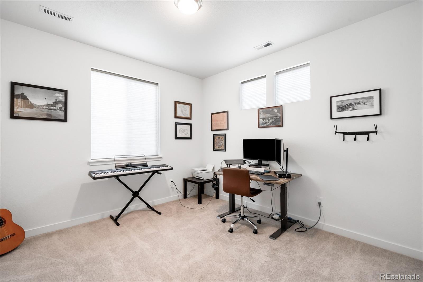 1928 Marlowe Circle West Erie, CO 80516 - Photo 20 of 47 a view of a workspace with a window