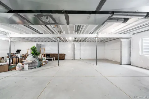 a view of a garage with sitting area