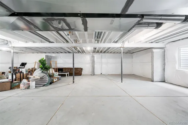 a view of a garage with sitting area