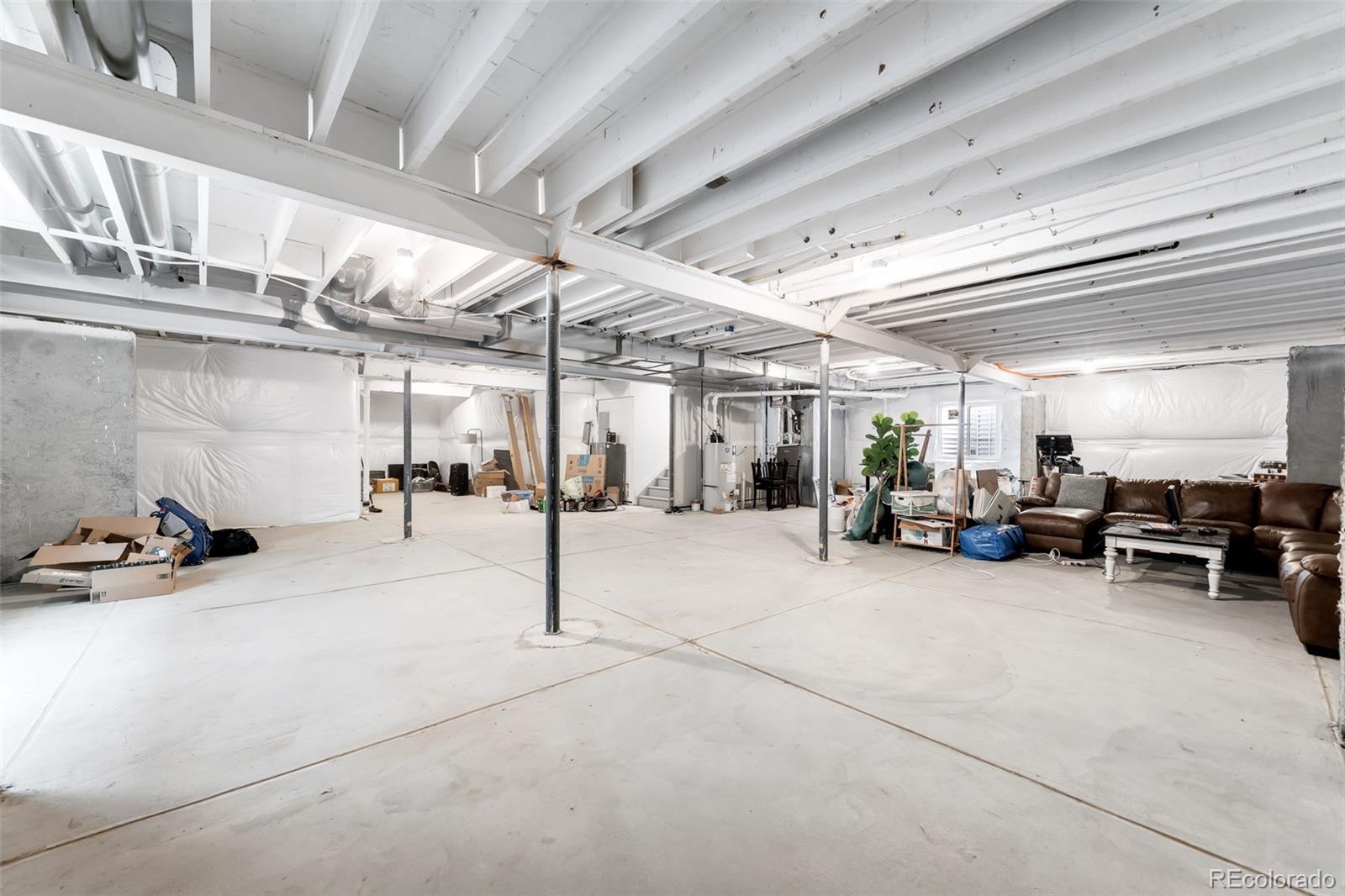 1928 Marlowe Circle West Erie, CO 80516 - Photo 40 of 47 a view of a garage with storage
