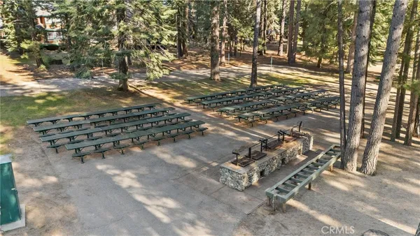 swimming pool with table and chairs
