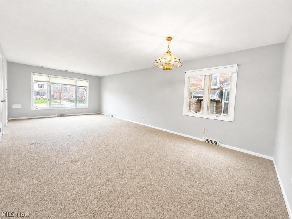 13630 Cedar Road, Unit LOWR University Heights, OH 44118 - Photo 3 of 19 living room looking at front of house