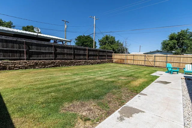a view of a swimming pool with a garden