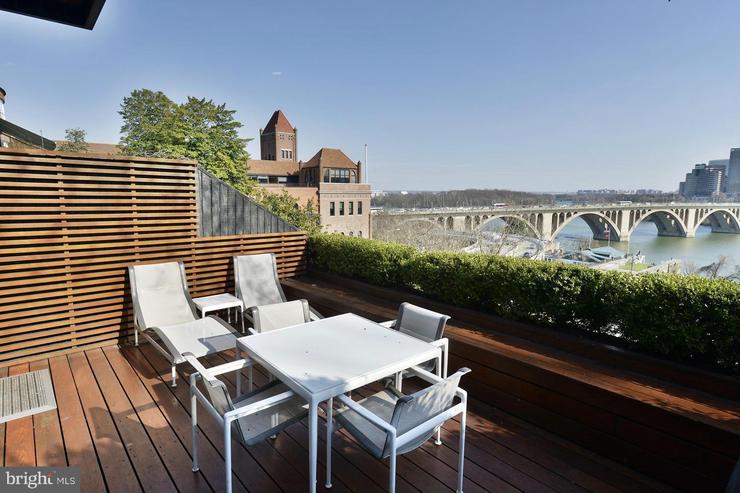 3618 Prospect Street Northwest Washington, DC 20007 - Photo 11 of 30 a terrace with outdoor seating and trees