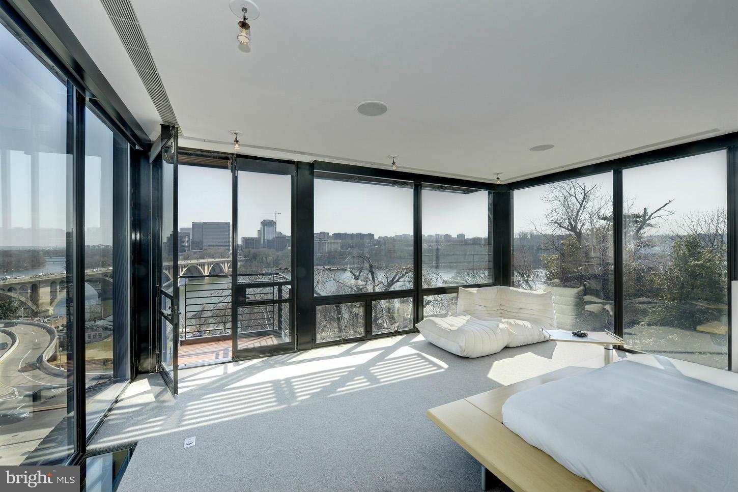 3618 Prospect Street Northwest Washington, DC 20007 - Photo 17 of 30 a living room with furniture and a floor to ceiling window