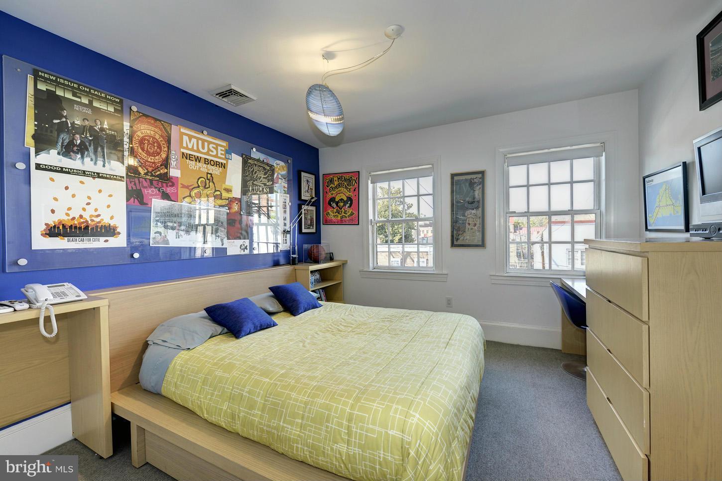 3618 Prospect Street Northwest Washington, DC 20007 - Photo 26 of 30 a bed room with two beds and a large window