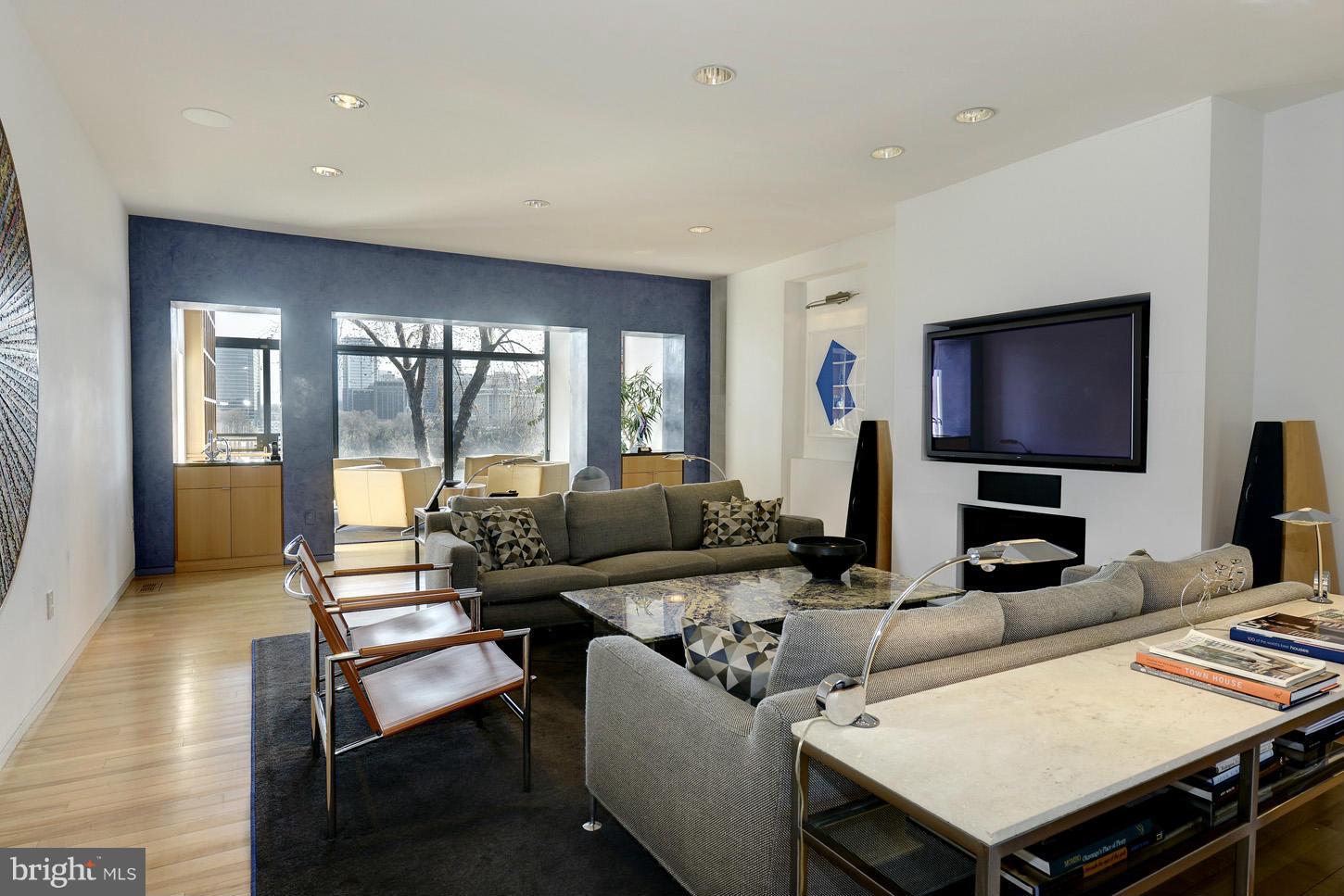 3618 Prospect Street Northwest Washington, DC 20007 - Photo 5 of 30 a living room with furniture and a flat screen tv