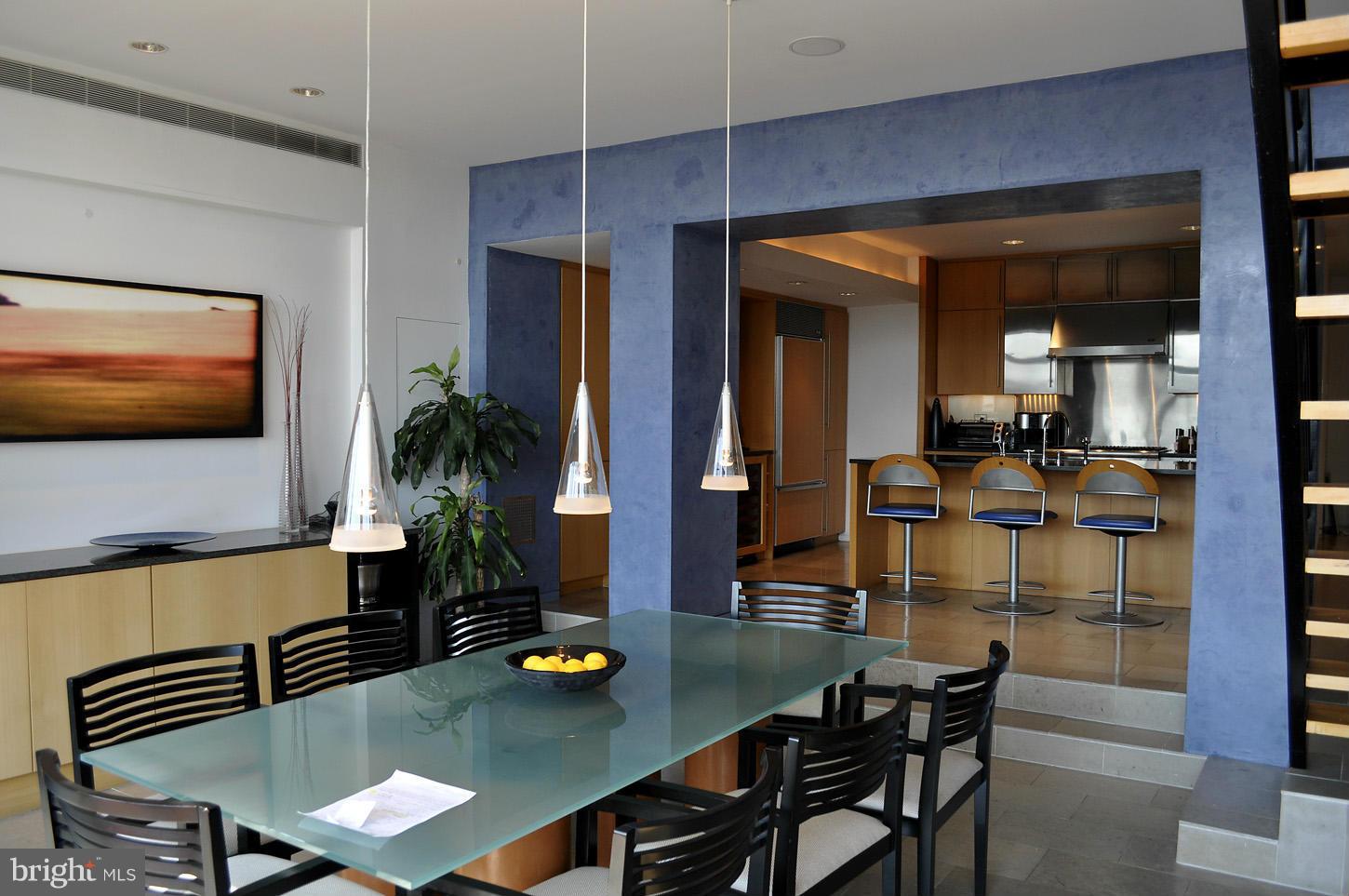 3618 Prospect Street Northwest Washington, DC 20007 - Photo 10 of 30 a view of a dining room with furniture and wooden floor
