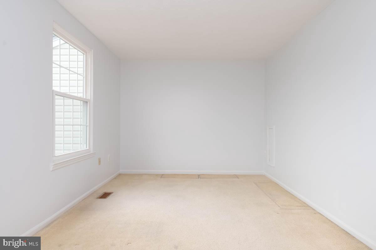 1312 Acorn Ridge Court Edgewood, MD 21040 - Photo 18 of 39 an empty room with a window