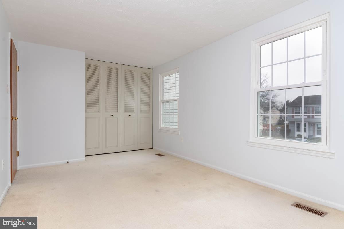 1312 Acorn Ridge Court Edgewood, MD 21040 - Photo 21 of 39 an empty room with windows